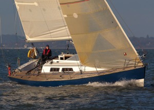 Kass sailing Zest off Cowes Green
